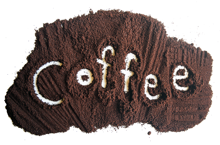 The word "coffee" spelled in spilled coffee grounds.