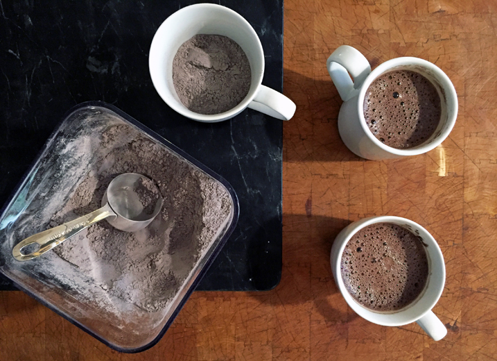 Homemade hot cocoa mix from Alton Brown in three white mugs
