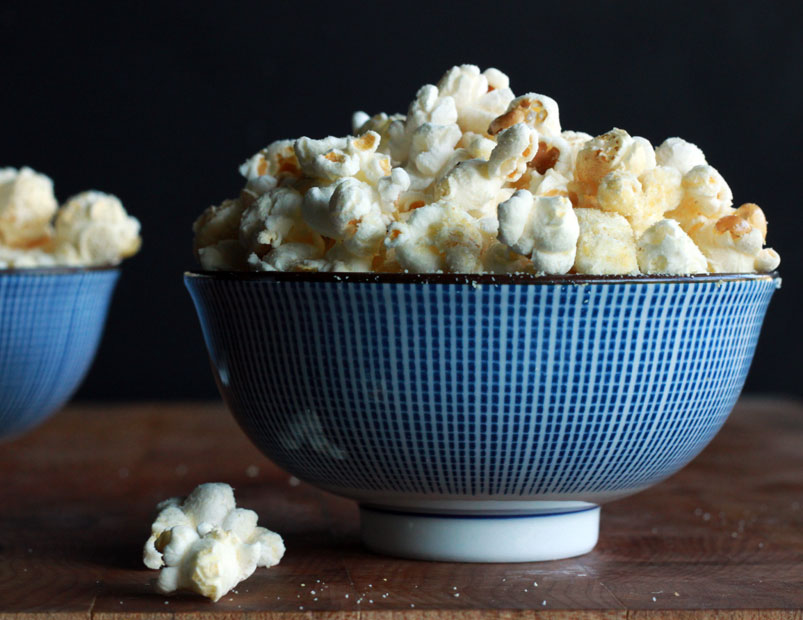 Triple cheese popcorn in a blue bowl