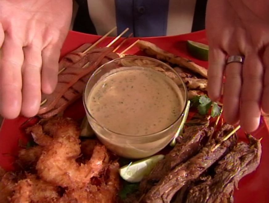 Cashew sauce served with coconut shrimp and other grilled skewers.