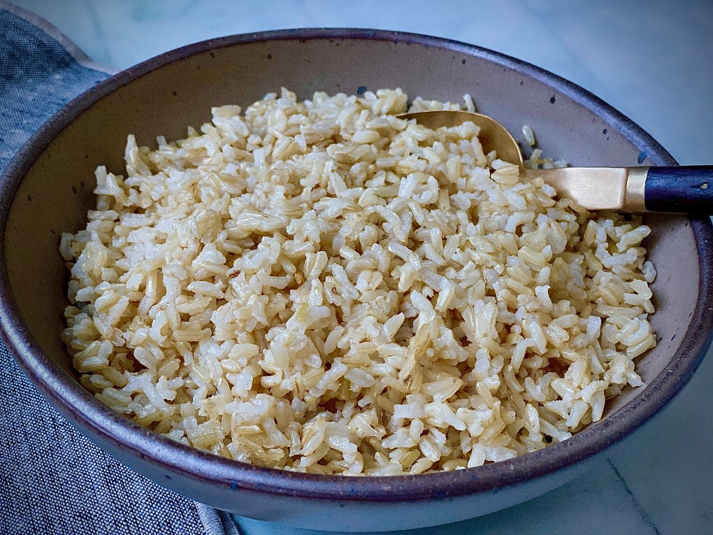 Baked brown rice in a bowl.