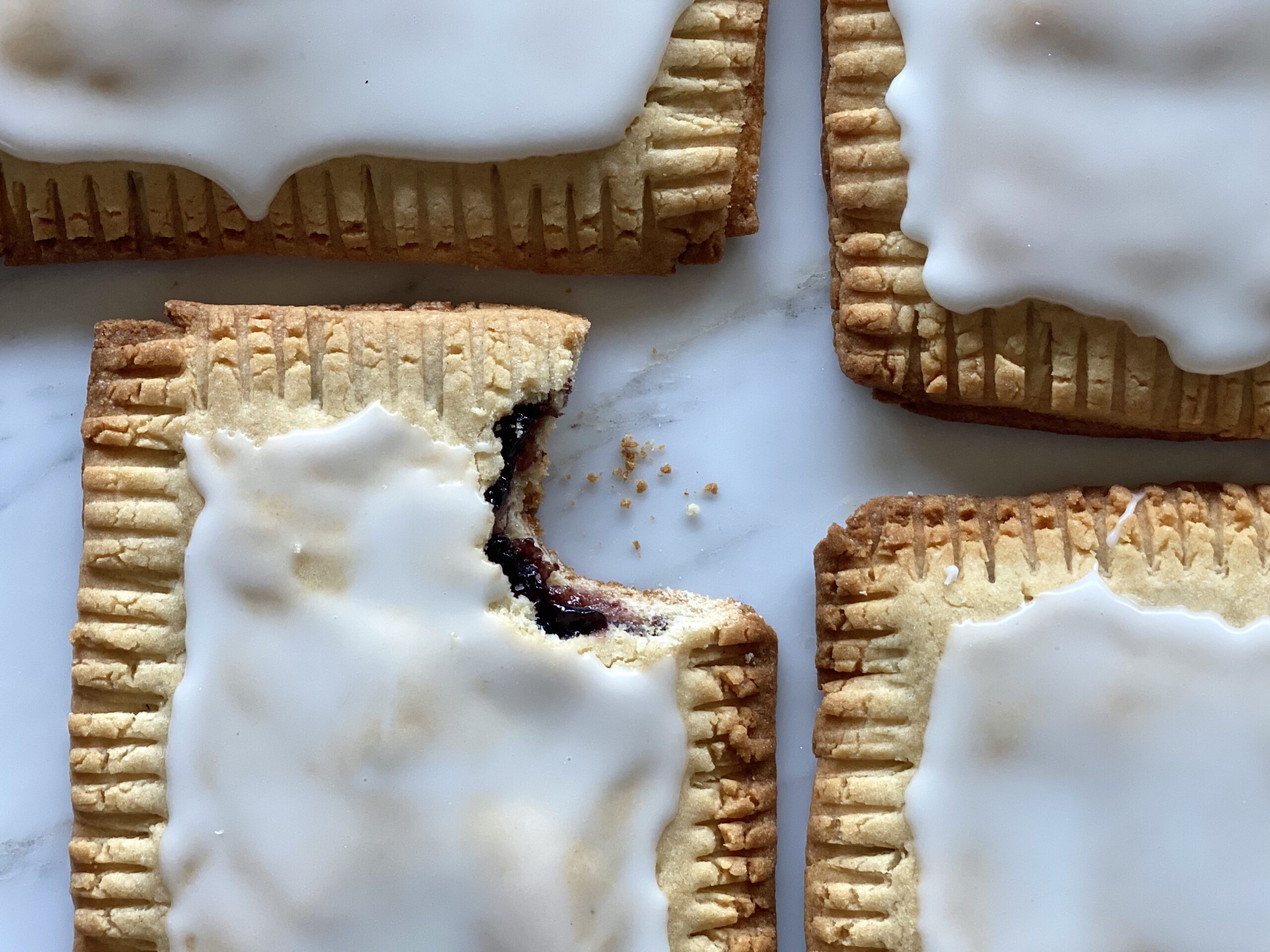 Homemade copycat pop tart with flaky dough and sweet jam filling, a nostalgic breakfast treat reimagined.